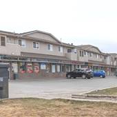 Halston Strip Mall with Cornerstone Smoke Shop Market EXT