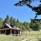 Akashic Ranch 04 Serendipity Cabin overlooking Curry Lake at Bestwick Mountain