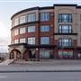 Reservoir Coffee and Back of Building & Parking across the Street at TRU