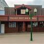 THE VILLAGE IDIOT BAR & GRILL