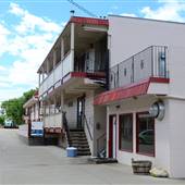 SPANISH FIESTA MOTEL aka FALCON RESORT