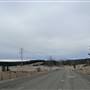 Logan Lake Two-Lane Paved Hwy w Adjoining Dirt Road